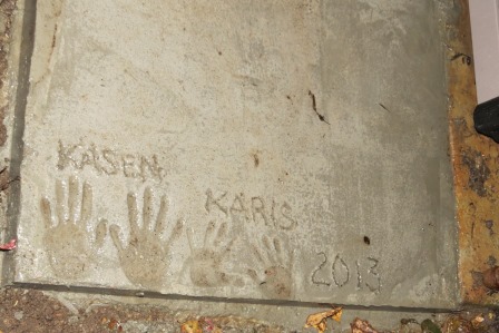 Kasen and Karis' concrete handprints